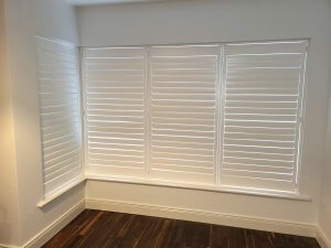 l shaped bay window louvres closed